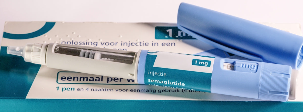 Insulin pen and its packaging are shown.